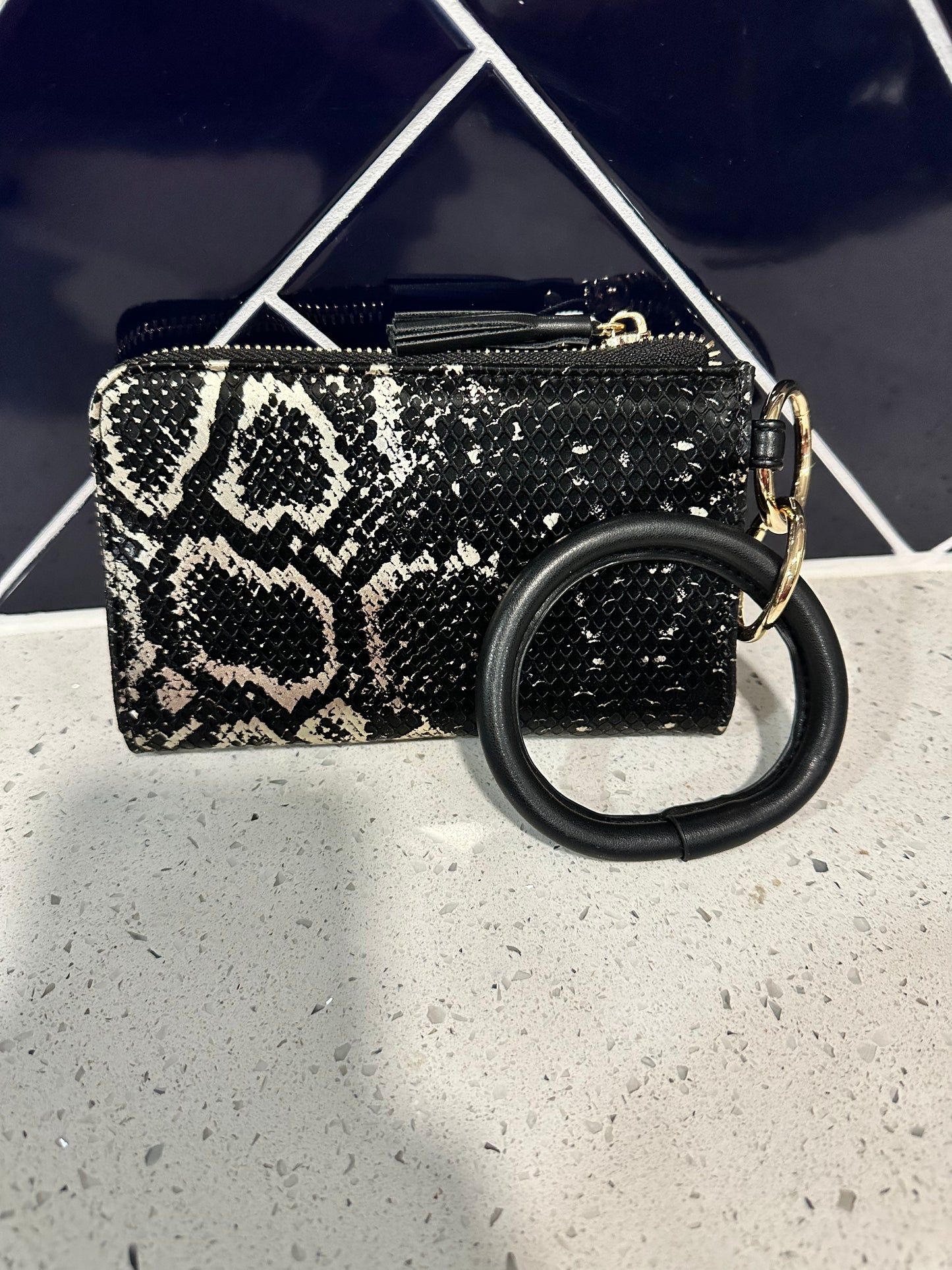 Liv snake skin wristlet